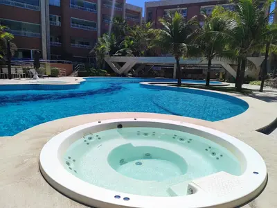 A piscina em ou perto de Apartamento em Condomínio Resort vizinho ao Beach Park