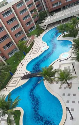 A piscina em ou perto de Apartamento em Condomínio Resort vizinho ao Beach Park