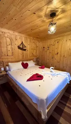Uma cama ou camas num quarto em Pousada Barra Nova Praiamar