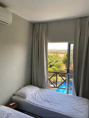 Uma cama ou camas num quarto em Apto Praia da Taíba Vista Mar