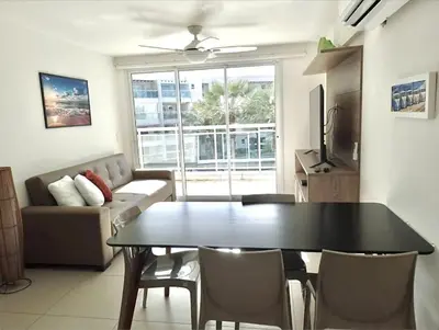 Uma área de estar em Riviera Aquiraz Golf Beach Place Ceará - Apartamento pé na areia
