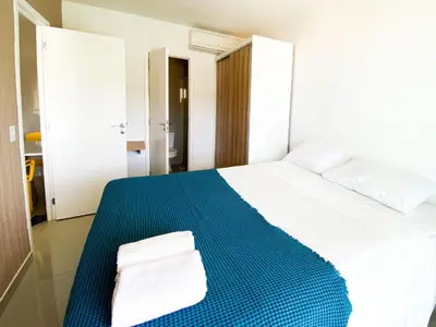 Uma cama ou camas num quarto em VG Fun | Praia do Futuro - CE