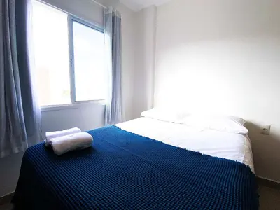 Uma cama ou camas num quarto em VG Fun | Praia do Futuro - CE