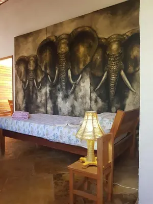 Uma área de estar em Villa Cajuiero Inn