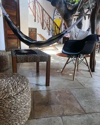 Uma área de estar em Villa Cajuiero Inn