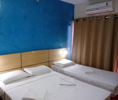 Uma cama ou camas num quarto em Tabajara Flats Praia de Iracema
