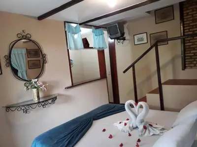Uma cama ou camas num quarto em Hotel O Alemão