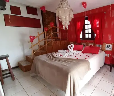 Uma cama ou camas num quarto em Hotel O Alemão