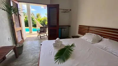 Uma cama ou camas num quarto em Bambo Villa