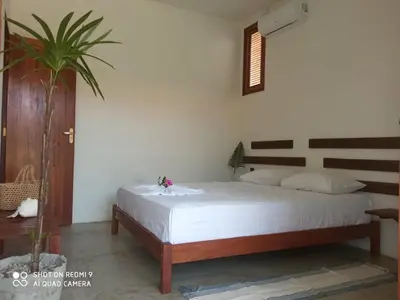 Uma cama ou camas num quarto em Bambo Villa