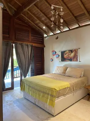 Uma cama ou camas num quarto em App Sere KiteVillage