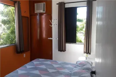 Uma cama ou camas num quarto em Excelente localização, uma quadra antes do BEACH PARK