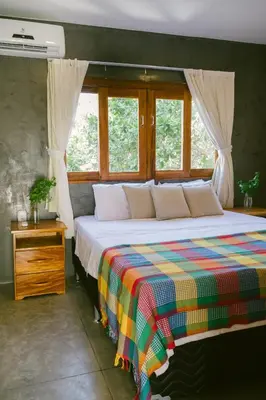 Uma cama ou camas num quarto em La Casina Jericoacoara
