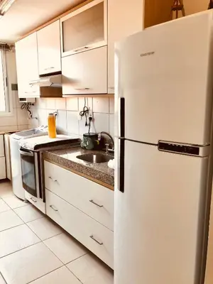 A cozinha ou kitchenette de Beach Front Apartment near Beach Park