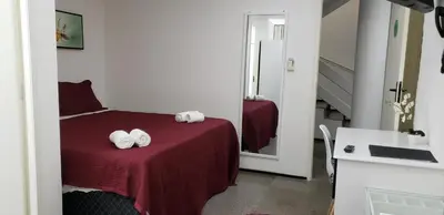 Uma cama ou camas num quarto em LIVE IN FORTALEZA HOTEL