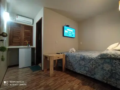 Uma cama ou camas num quarto em Pousada A Casinha