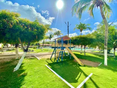 A área de jogos para crianças em Ap da Tia Fê no paraíso da Praia de Morro Branco