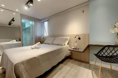 Uma cama ou camas num quarto em Porto Iracema #1112 - Apê moderno por Carpediem