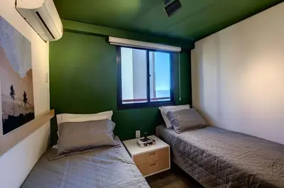 Uma cama ou camas num quarto em Porto Iracema #1112 - Apê moderno por Carpediem