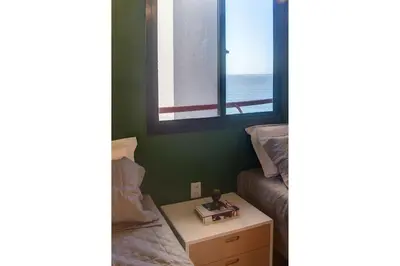 Uma cama ou camas num quarto em Porto Iracema #1112 - Apê moderno por Carpediem