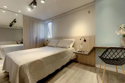 Uma cama ou camas num quarto em Porto Iracema #1112 - Apê moderno por Carpediem