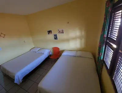 Uma cama ou camas num quarto em Apartamento 04 - Praia do Futuro