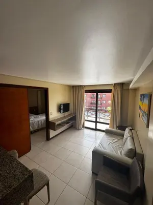 Uma cama ou camas num quarto em KARIRI BEACH_CUMBUCO BOUTIQUE APARTMENTS