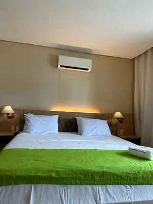 Uma cama ou camas num quarto em KARIRI BEACH_CUMBUCO BOUTIQUE APARTMENTS