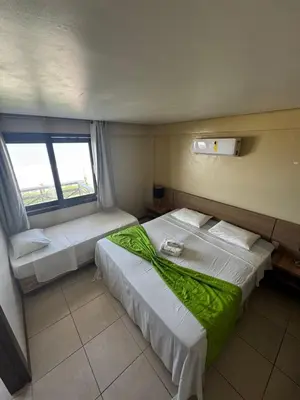 Uma cama ou camas num quarto em KARIRI BEACH_CUMBUCO BOUTIQUE APARTMENTS