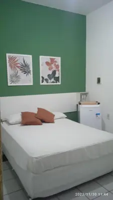 Uma cama ou camas num quarto em House755 Hospedaria