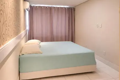 Uma cama ou camas num quarto em Excelente Apartamento Sofisticado na Praia do Futuro