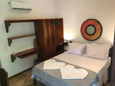 Uma cama ou camas num quarto em Casa Bouganville apartamento 4