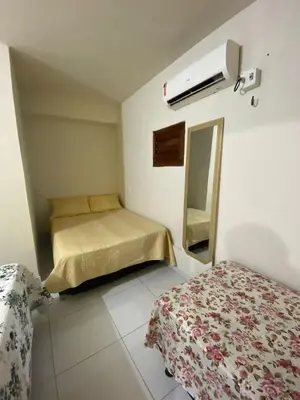 Uma cama ou camas num quarto em Chalé da Kikia