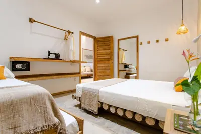 Uma cama ou camas num quarto em Casa PESQUEIRA Preá - Frente Mar!