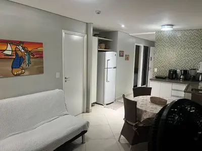Uma área de estar em LANDSCAPE - Apartamento Mobiliado na Beira Mar
