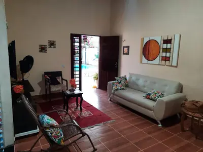 Uma área de estar em casa praia de guajiru