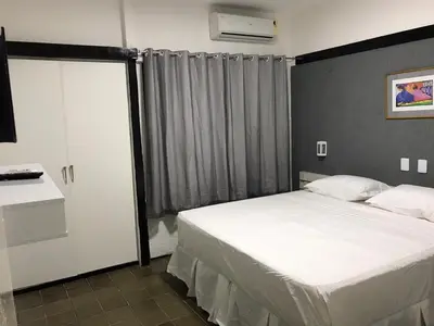 Uma cama ou camas num quarto em 501 Lindo Flat mobiliado Praia de Iracema
