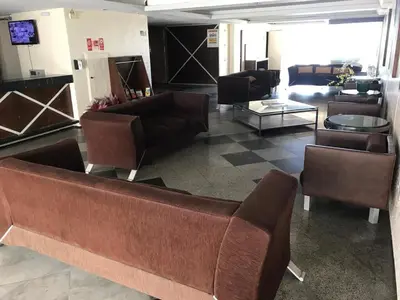 Uma área de estar em 404 Flat mobiliado Praia de Iracema