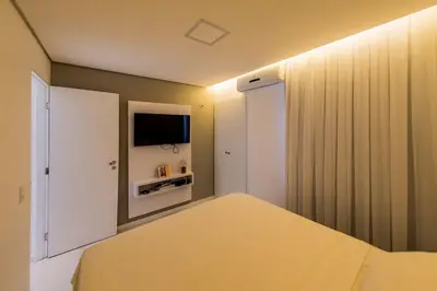 Uma cama ou camas num quarto em 507 Lindo Flat mobiliado na Praia de Iracema