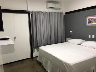 Uma cama ou camas num quarto em 401 Lindo Flat mobiliado Praia de Iracema