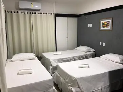 Uma cama ou camas num quarto em 401 Lindo Flat mobiliado Praia de Iracema