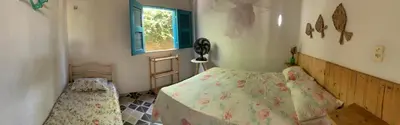 Uma cama ou camas num quarto em Casa em Mundaú Trairi-Ce