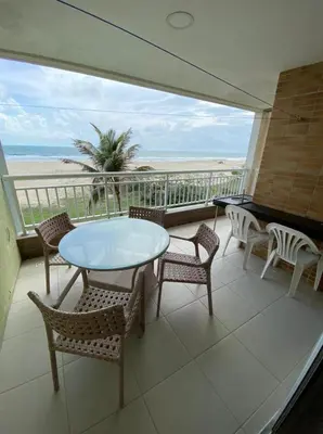 Uma varanda ou terraço em TerraMaris Apartamento Beira Mar Pé na areia