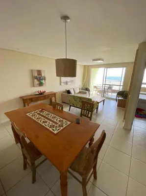 Uma área de estar em TerraMaris Apartamento Beira Mar Pé na areia
