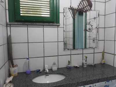 Uma casa de banho em Porto Canoa Resort