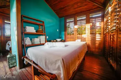 Uma cama ou camas num quarto em Vila Vagalume