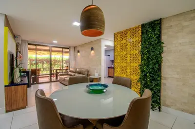 Uma área de estar em Mandara Lanai Apartamento Terreo