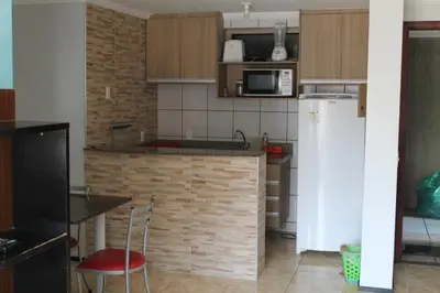 A cozinha ou kitchenette de Porto de Iracema Beach Apartamentos