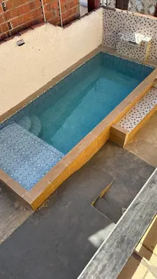 A piscina em ou perto de Residência Tatiane canoa