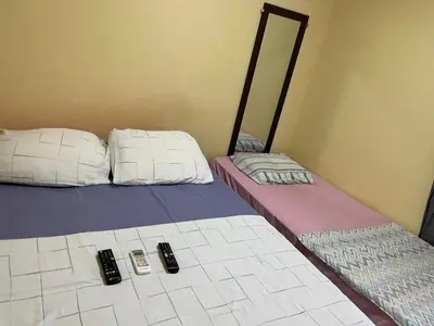 Uma cama ou camas num quarto em ARTE FLATS